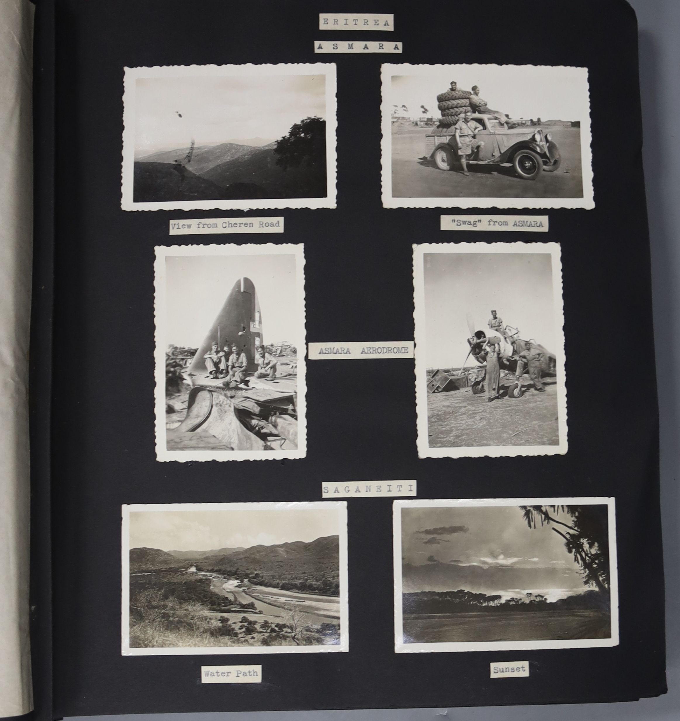 World War II album containing photos of an RAF units travels across Egypt, Saudi Arabia, Palestine, Jerusalem etc. as well as photos of natives, the troops and their equipment and postcards, together with an associated p